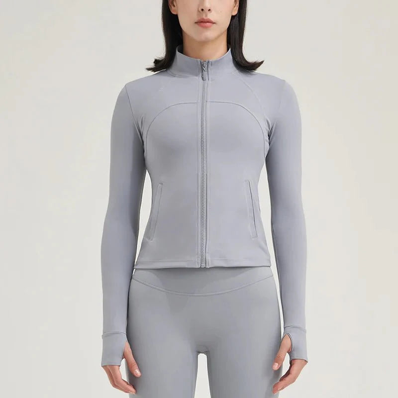 Chaqueta Fitness cortavientos ligero con protección solar de mujer gris