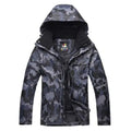 Chaqueta Look cortavientos de camuflaje con acolchado térmico para hombre impermeable gris